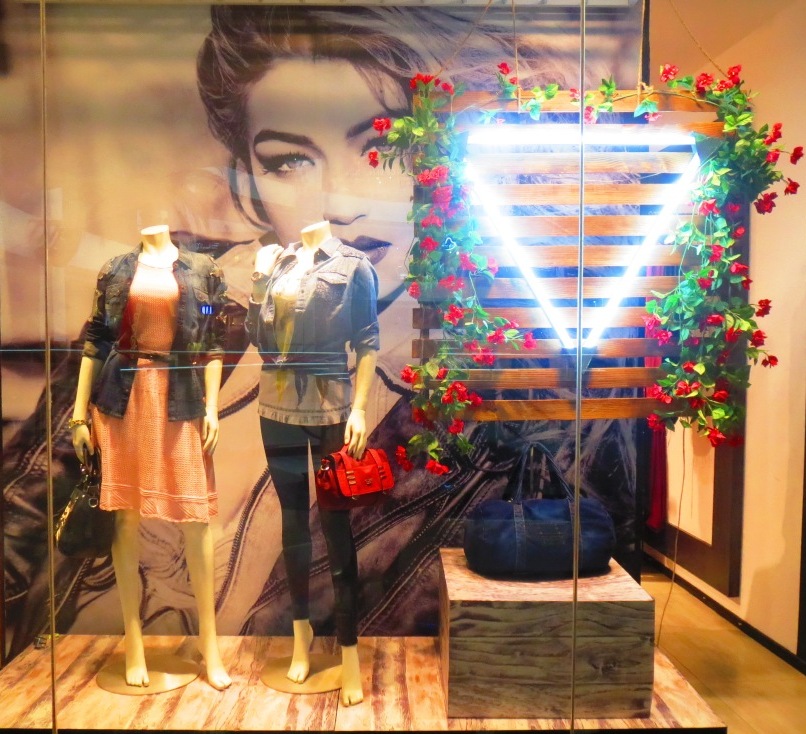 guess pop colors in diwali window- through the glass