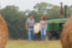 Dad and I walking in hay field2.jpeg