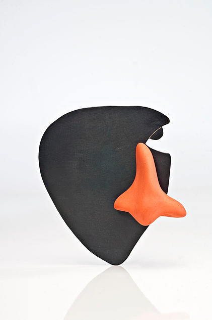 Selen Ozus - "as" brooch - porcelain, iron 2011