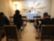 Adoration chapel at St. Therese with worshipers and monstrance