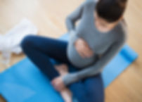Pregnant Woman Practicing Yoga