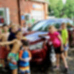 Campers washing cars