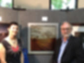 brownie harris with dorian hill receiving an award for iphoneography landscape print