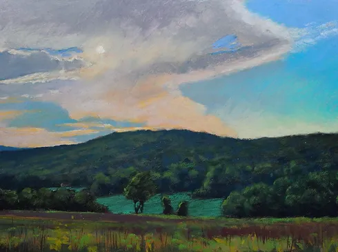 the soft pastel woods and hills