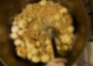 Combining shallots with chickpeas and flour, Moghrabieh Recipe, Lebanese food, Beirut, Lebanon
