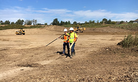 Survey crew on area grading job