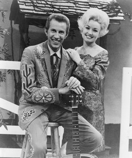 Dolly Parton & Porter Wagoner (Image via Wikipedia)