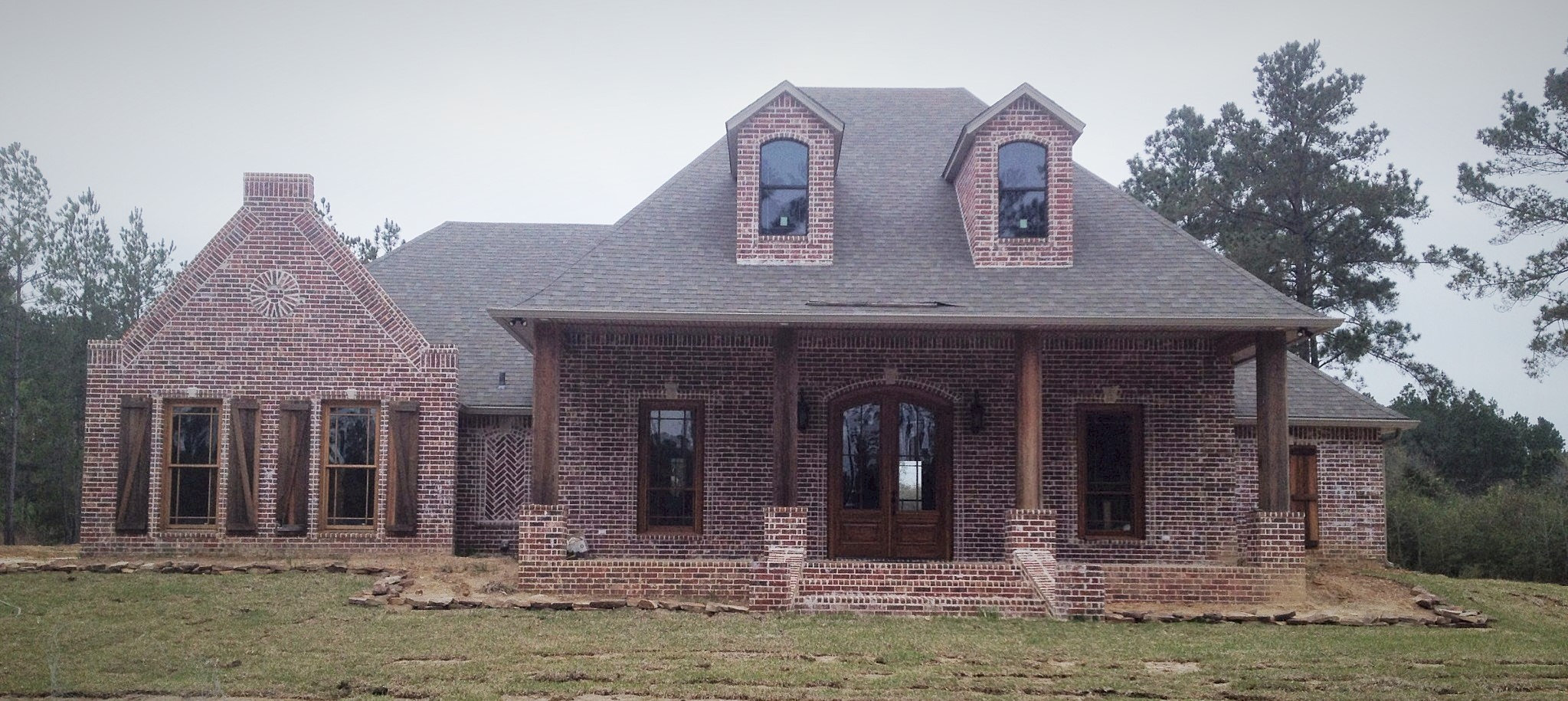 Madden Home Design - Acadian House Plans, French Country House ...  All brick front.