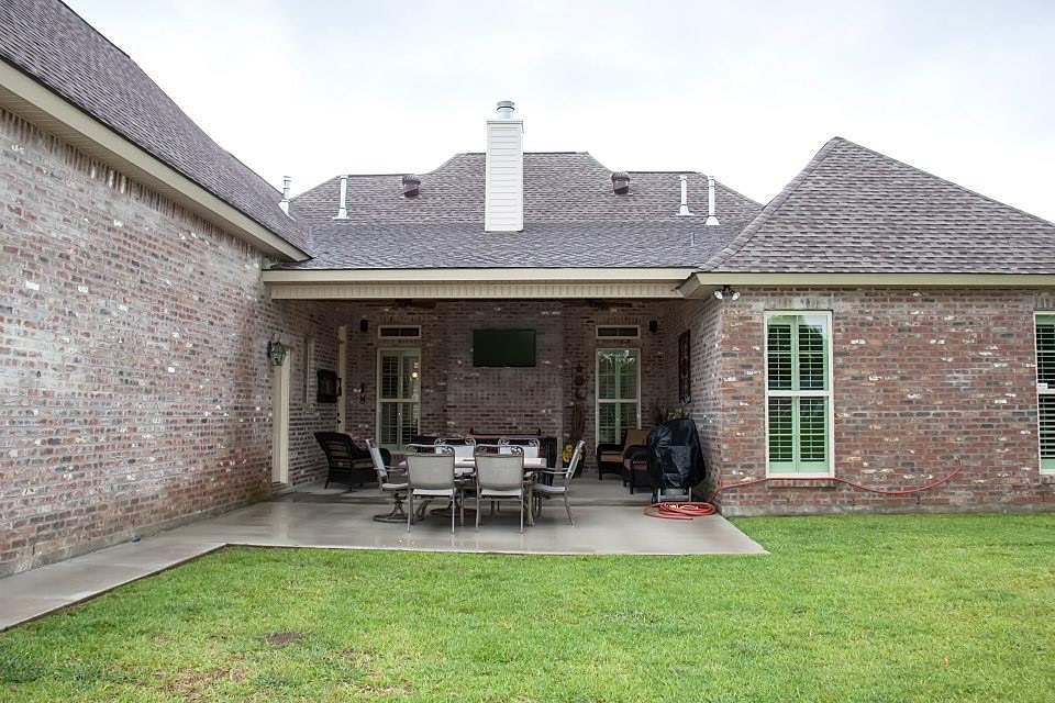 Madden Home Design - Acadian House Plans, French Country House ...  Rear view.