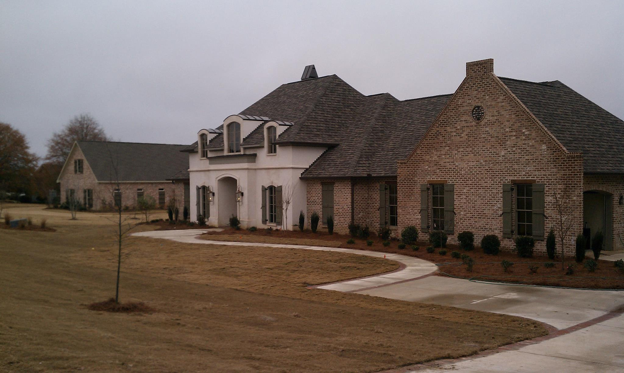Madden Home Design - Acadian House Plans, French Country House ...  Front view - with all stucco front.
