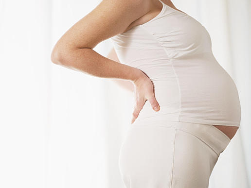 Natural pain relief during pregnancy with exercise, meditation, and chiropractic care at Align Integrated Medical Clinic.