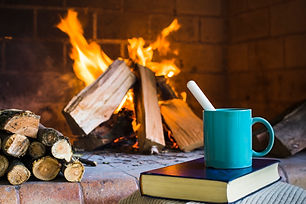 beverage-and-book-near-fireplace.jpg