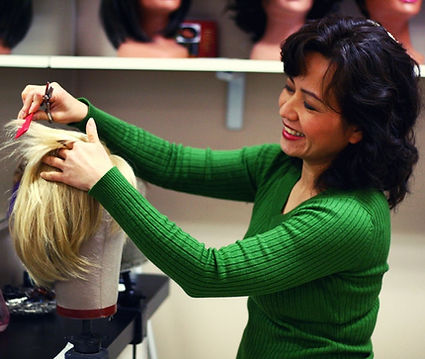 Woman styling a wig