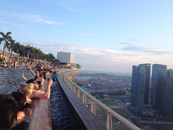 The reality of the Marina Bay Sand's pool is its packed full of people taking pictures