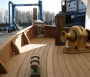 new bulwarks and teak decking meet at the 75 year