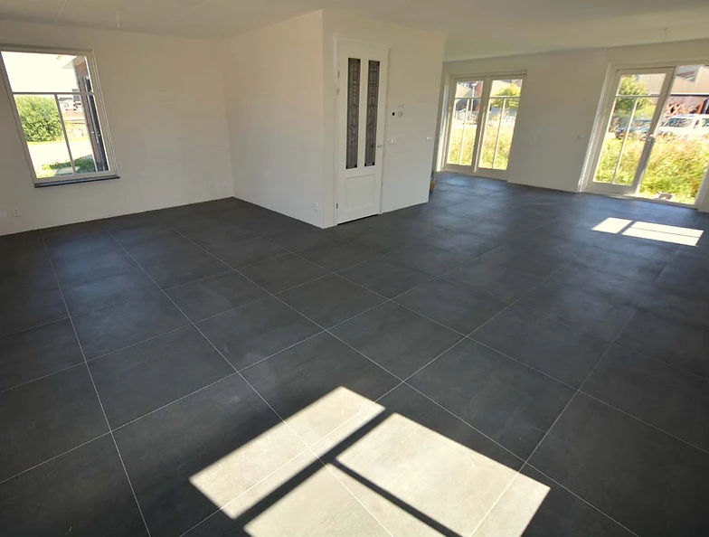 Tegelvloer 75x75 woonkamer Woonhuis in Grootebroek Tegelvloer 75x75 woonkamer Woonhuis in Grootebroek