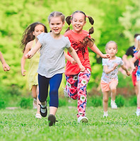 happy kids running and playing outside