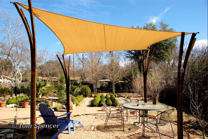 Shade sails are a great way of extending the use of patio spaces well 