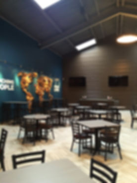 Element Church concourse coffee cafe seating lounge and decorative wall art. DE|SL LLC