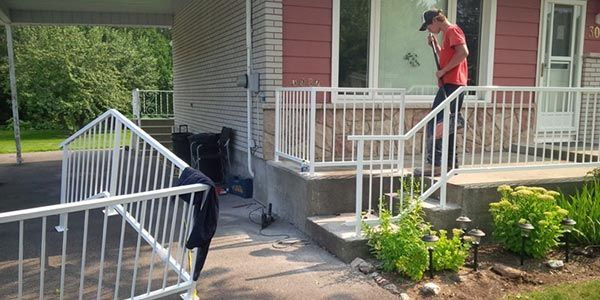 Showing railings and a worker