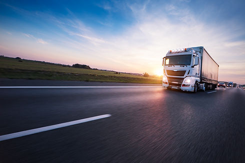 Loaded European truck on motorway in bea