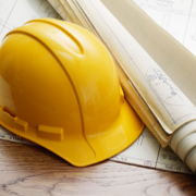Hard hat and blueprints