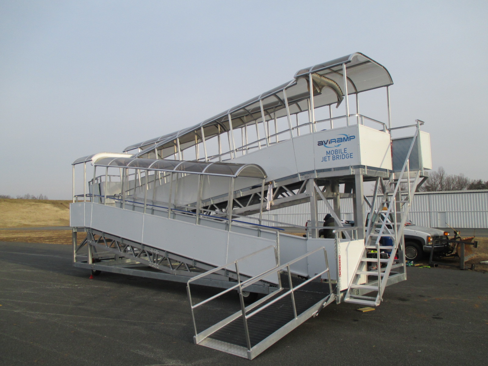 Aircraft Boarding Ramps and Bridges aircraft passenger ramp with canopy
