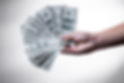 person%20holding%20100%20US%20Dollar%20b