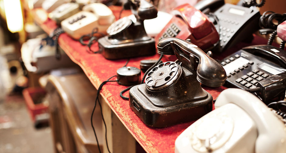 Old telephones in a row