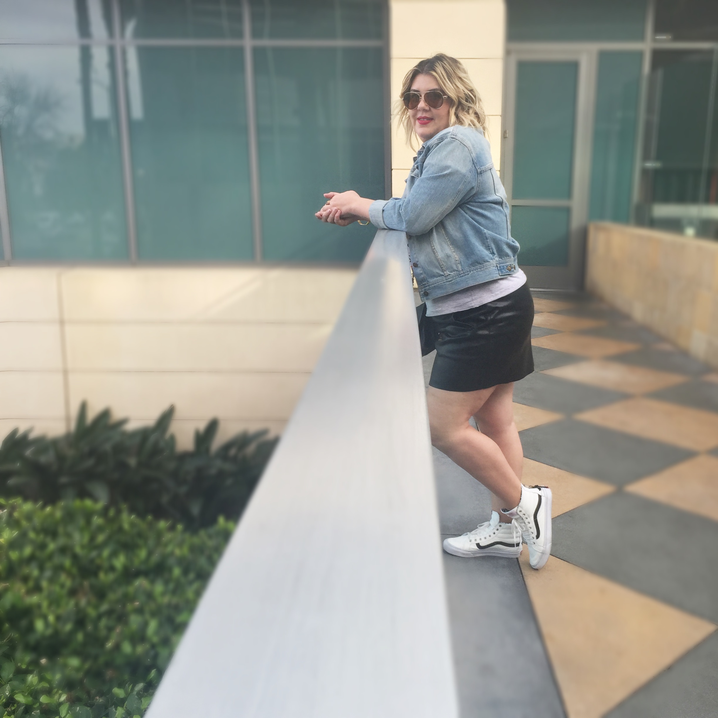 white high top vans on feet