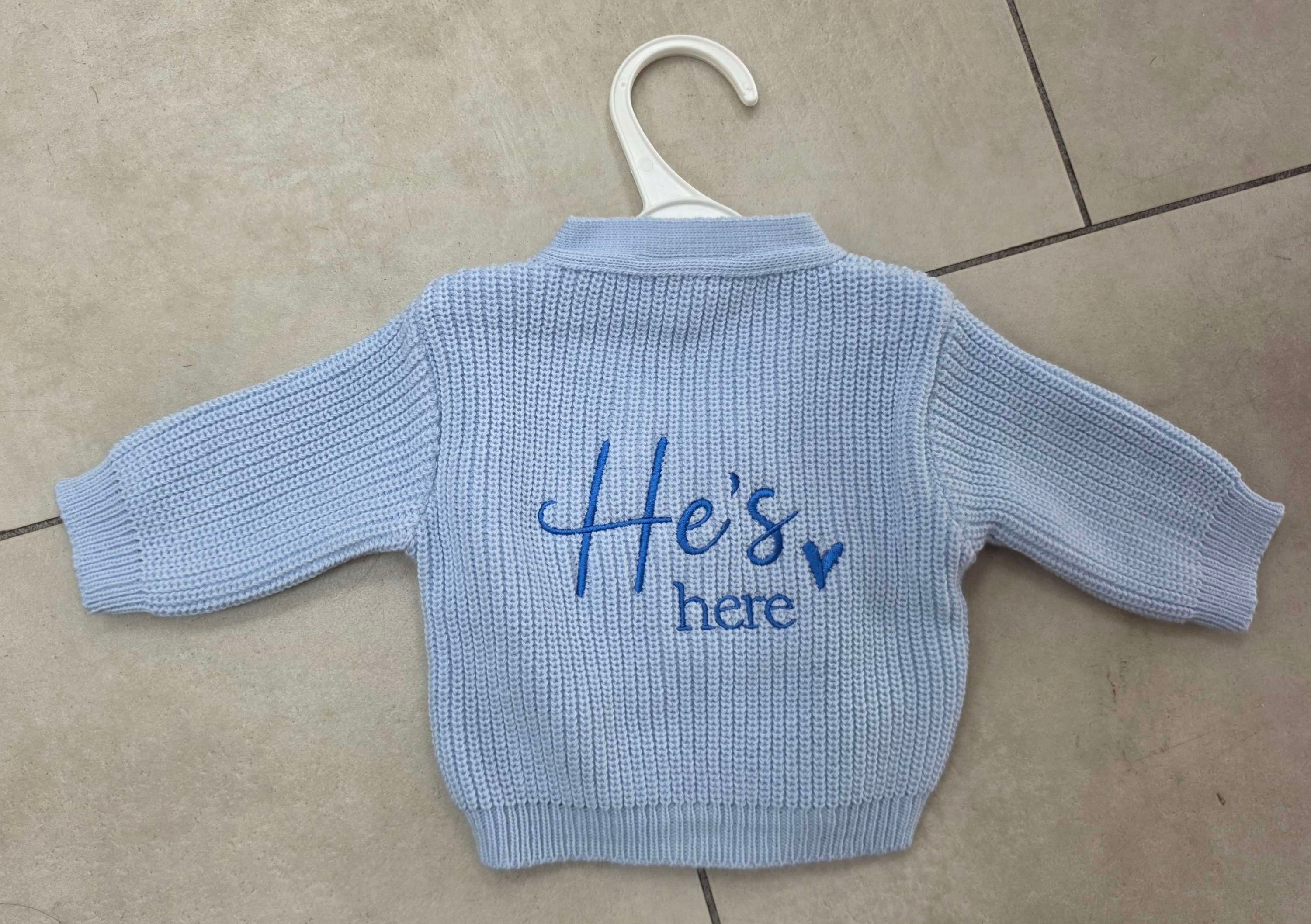 He's Here Baby Knit Cardigan in Soft Blue with Embroidered Text for Newborns and