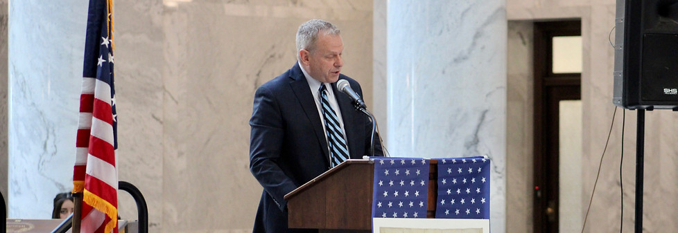 Representative Owens speaking at an event
