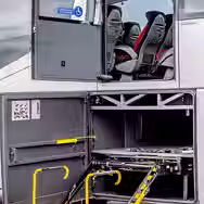 Accessible coach entry with step lift for passenger boarding