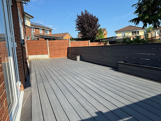 Spacious wooden deck with grey planks