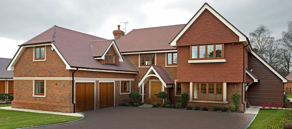 Modern brick detached house with garage and tiled roof