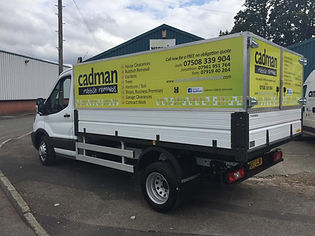 Cadman rubbish removal van outside Wigan property
