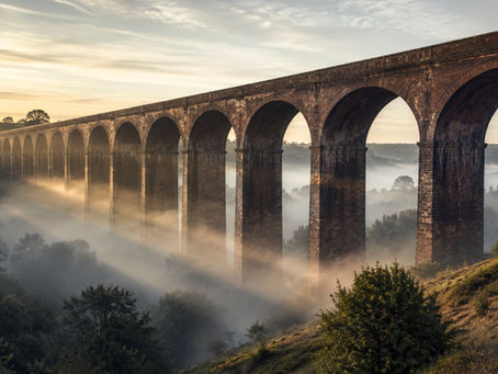 Victorian railway viaduct at dawn, illustrating the historical evidence behind AI and stock returns