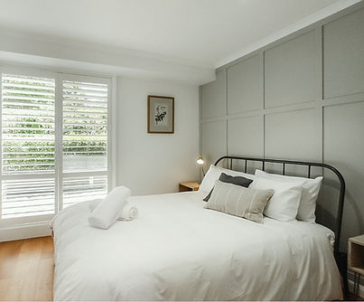 Queen bedroom at Hillgate with private ensuite bathroom and deck