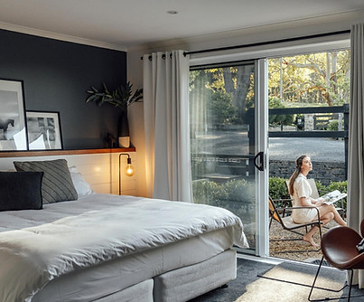 Bedroom at Hillgate features a split king bed, ensuite bathroom and garden patio