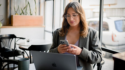 Leni Bolt working laptop and smartphone