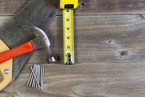 basic-home-repair-tools-weathered-wood-top-view-consisting-saw-hammer-nails-tape-measure-r