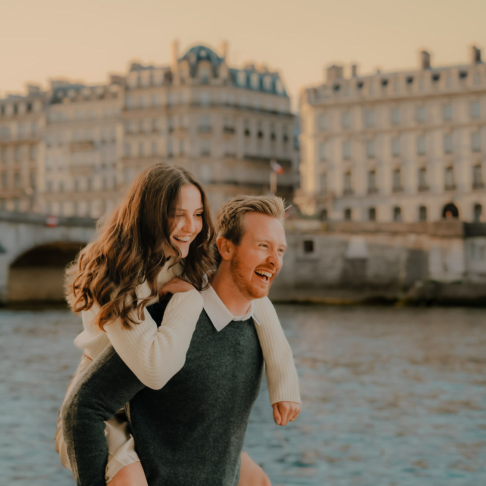 Close-up view of a couple sharing a quiet moment on a Parisian bridge