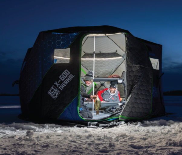 men inside an ice shelter