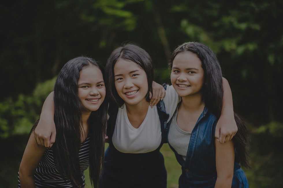 happy-teenage-friends-smiling-outdoors-park_edited_edited_edited.jpg