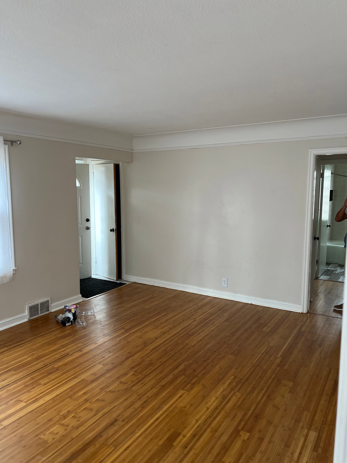 Empty living room with hardwood floors