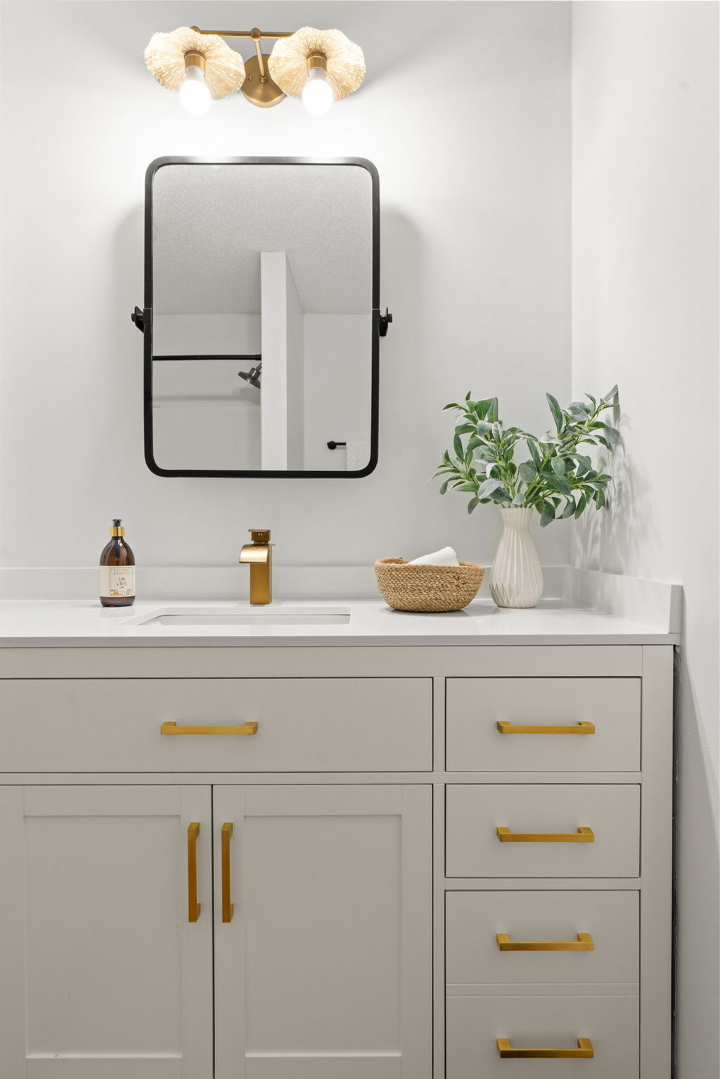 Montrose Modern bathroom vanity with gold faucet and pulls