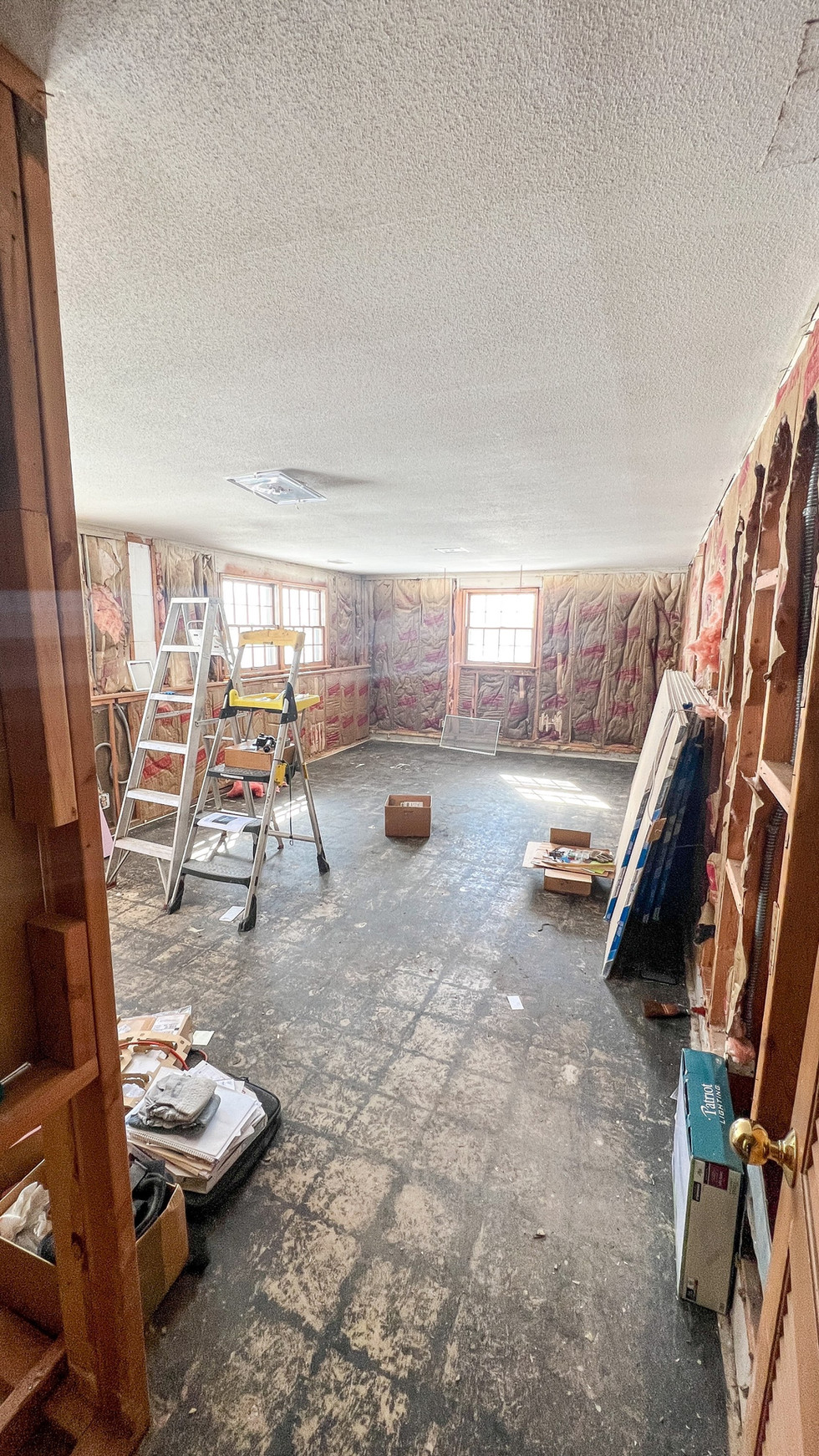 Interior room under renovation, exposed walls and insulation