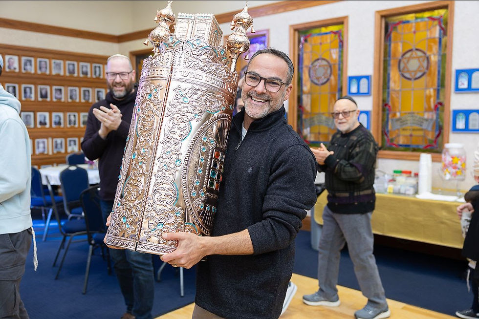 Sephardic Community of Indianapolis member celebrating the new Sefer Torah Dedication at Etz Chaim Sephardic Congregation