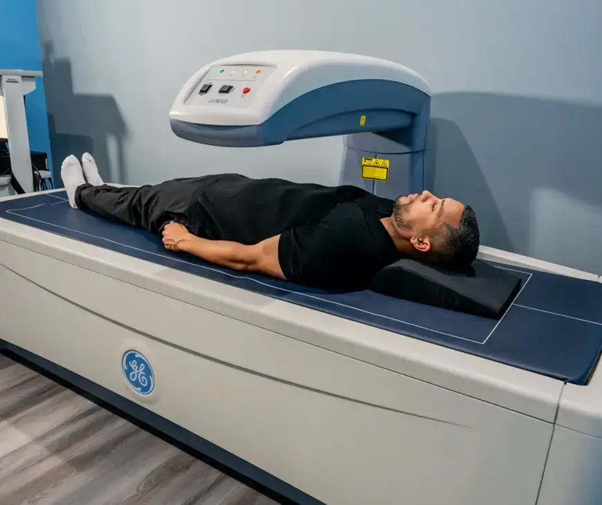 High-angle view of an individual undergoing a body composition analysis