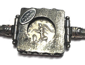Reverse of the hand made silver bracelett with Roman Coin